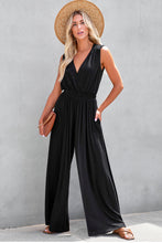 Load image into Gallery viewer, Black Deep V Pleated Crisscross Wide Leg Backless Jumpsuit