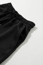 Load image into Gallery viewer, Black Textured Ruffle Split Top and Drawstring Shorts