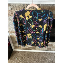 Cargar imagen en el visor de la galería, Maggie London 100% Silk Black Tassel Print Puff Sleeve Top with Good Buttons
