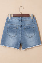 Load image into Gallery viewer, Dusk Blue Pearl Beaded Raw Hem Medium Wash Denim Shorts
